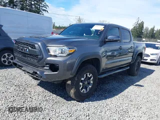 2019 Toyota Tacoma SR z VIN 3TMCZ5AN9KM232882, wystawiony jako IAAI lot #41879314 z przebiegiem Nie podano mil oraz . Historia ofert i sprzedaży dostępna na DreamBid. Obrazek 2.