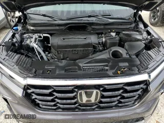 2025 Honda Pilot Touring with VIN 5FNYG2H75SB002553, listed as a Copart auction lot 76869764 with 7,426 mi miles and Salvage Title. Bid and sale history available at carsss.com. Image 12.