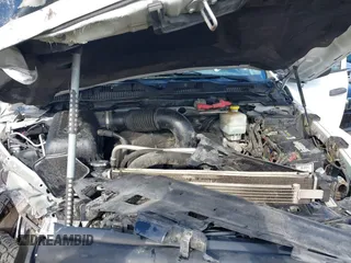 2014 Ram 2500 Tradesman z VIN 3C6TR5CT1EG234972, wystawiony jako IAAI lot #40605313 z przebiegiem 170 001 mil mil oraz . Historia ofert i sprzedaży dostępna na DreamBid. Obrazek 10.