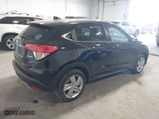 2020 Honda HR-V EX with VIN 3CZRU6H59LM737305, listed as a IAAI auction lot 41679197 with 76,670 mi miles. Bid and sale history available at carsss.com. Image 4.