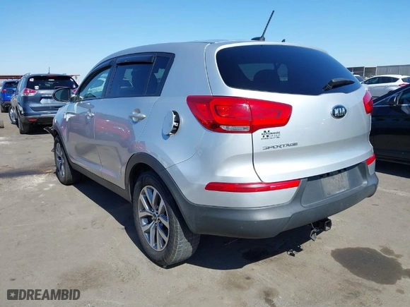 2015 Kia Sportage LX with VIN KNDPBCAC3F7678745, listed as a IAAI auction lot 41664074 with 124,526 mi miles. Bid and sale history available at carsss.com. Image 3.
