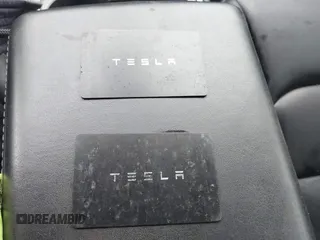 2021 Tesla Model 3 Long Range z VIN 5YJ3E1EB9MF014985, wystawiony jako IAAI lot #41672208 z przebiegiem 52 222 mil mil oraz . Historia ofert i sprzedaży dostępna na DreamBid. Obrazek 11.
