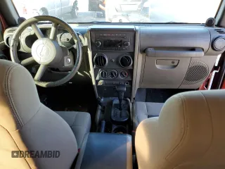 2008 Jeep Wrangler X with VIN 1J4FA24138L650659, listed as a Copart auction lot 70510504 with 170,806 mi miles and Salvage Title. Bid and sale history available at DreamBid. Image 8.