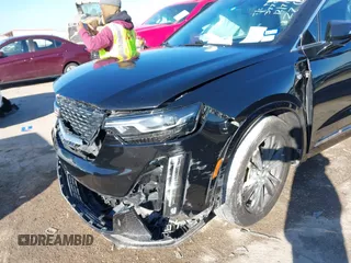2022 Cadillac XT6 Premium Luxury with VIN 1GYKPCRS1NZ121711, listed as a IAAI auction lot 41149624 with 62,887 mi miles and . Bid and sale history available at DreamBid. Image 6.