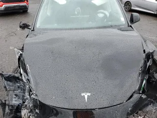 2024 Tesla Model Y Long Range with VIN 7SAYGDEE2RF131085, listed as a Copart auction lot 50171055 with Not Provided miles and Salvage Title. Bid and sale history available at DreamBid. Image 12.