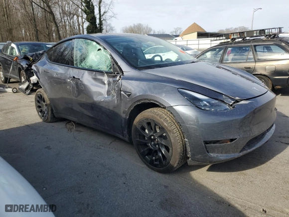 2023 Tesla Model Y Long Range with VIN 7SAYGDEE6PF841748, listed as a Copart auction lot 43748195 with 22,563 mi miles and Salvage Title. Bid and sale history available at carsss.com. Image 4.