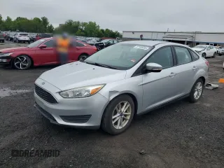 2016 Ford Focus SE z VIN 1FADP3F28GL240399, wystawiony jako Copart lot #57105695 z przebiegiem 87 871 mil mil oraz Szkoda całkowita • Salvage title. Historia ofert i sprzedaży dostępna na DreamBid. Obrazek 1.