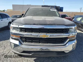2017 Chevrolet Silverado 1500 LT with VIN 1GCPCREC9HF216340, listed as a Copart auction lot 84867764 with 152,362 mi miles and Salvage Title. Bid and sale history available at DreamBid. Image 5.