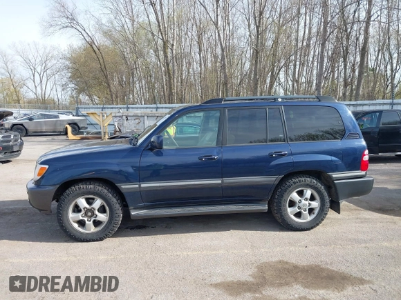 2004 Toyota Land Cruiser with VIN JTEHT05J942054673, listed as a IAAI auction lot 42112791 with 206,784 mi miles. Bid and sale history available at carsss.com. Image 14.
