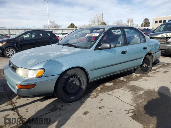1994 Toyota Corolla Deluxe with VIN JT2AE09B4R0067104, listed as a Copart auction lot 83565064 with 207,923 mi miles and Salvage title. Bid and sale history available at DreamBid. Image 1.