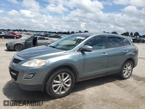 2012 Mazda CX-9 Grand Touring z VIN JM3TB2DA9C0350650, wystawiony jako Copart lot #60733775 z przebiegiem 246 128 mil mil oraz Szkoda całkowita • Salvage title. Historia ofert i sprzedaży dostępna na DreamBid. Obrazek 1.