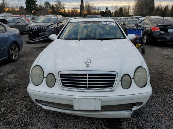 2001 Mercedes-Benz CLK-Class with VIN WDBLJ70G91F185789, listed as a Copart auction lot 86546174 with 140,958 mi miles and Salvage Title. Bid and sale history available at carsss.com. Image 5.