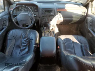 1999 Jeep Grand Cherokee Laredo z VIN 1J4GW58N8XC736438, wystawiony jako Copart lot #88605625 z przebiegiem 181 612 mil mil oraz Czysty tytuł • Clean title. Historia ofert i sprzedaży dostępna na DreamBid. Obrazek 8.