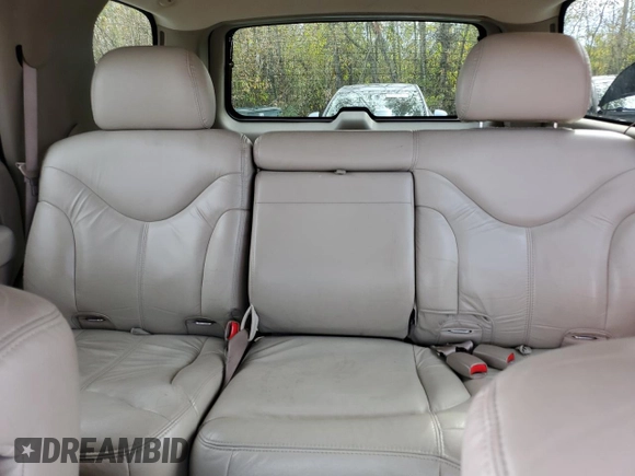 2002 GMC Yukon SLT z VIN 1GKEK13Z52J184367, wystawiony jako Copart lot #75938904 z przebiegiem 119 717 mil mil oraz Szkoda całkowita • Salvage title. Historia ofert i sprzedaży dostępna na DreamBid. Obrazek 10.