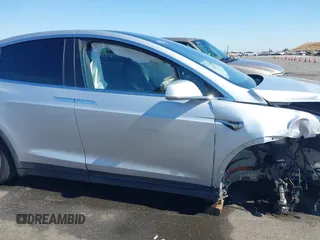 2016 Tesla Model X 70D with VIN 5YJXCAE21GF033123, listed as a IAAI auction lot 39813497 with 162,509 mi miles and . Bid and sale history available at DreamBid. Image 14.