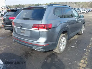 2021 Volkswagen Atlas SE z VIN 1V2WR2CA0MC585259, wystawiony jako IAAI lot #41525783 z przebiegiem 80 101 mil mil oraz . Historia ofert i sprzedaży dostępna na DreamBid. Obrazek 4.