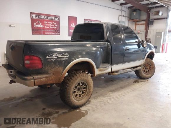 1998 Ford F-150 XL with VIN 1FTRX08L6WKA88552, listed as a IAAI auction lot 41549860 with 141,247 mi miles and . Bid and sale history available at DreamBid. Image 4.