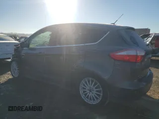 2015 Ford C-Max Energi SEL with VIN 1FADP5CUXFL110219, listed as a Copart auction lot 77474093 with 102,306 mi miles. Bid and sale history available at carsss.com. Image 2.