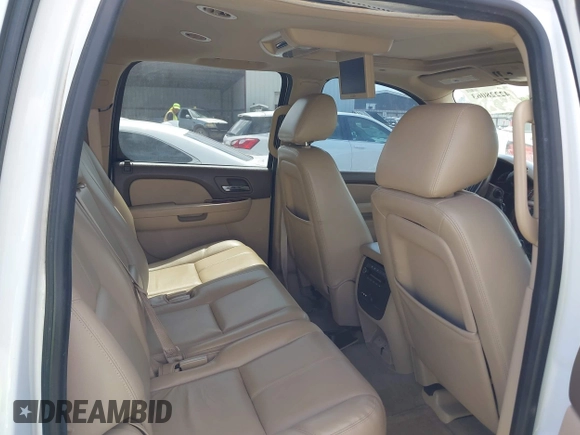 2013 Chevrolet Suburban LT with VIN 1GNSCJE08DR102735, listed as a IAAI auction lot 42228063 with 101,671 mi miles and . Bid and sale history available at DreamBid. Image 8.