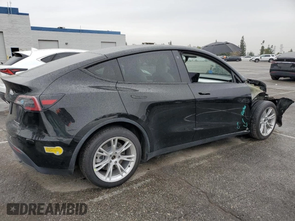 2021 Tesla Model Y Long Range with VIN 5YJYGDEEXMF294556, listed as a Copart auction lot 46668035 with 42,772 mi miles and Salvage Title. Bid and sale history available at DreamBid. Image 3.
