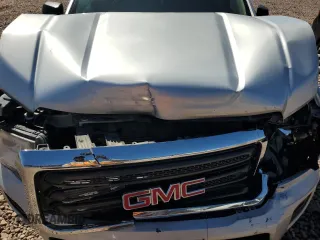 2016 GMC Canyon 2WD with VIN 1GTG5BEA1G1390236, listed as a Copart auction lot 50058495 with 143,316 mi miles and Salvage Title. Bid and sale history available at carsss.com. Image 11.