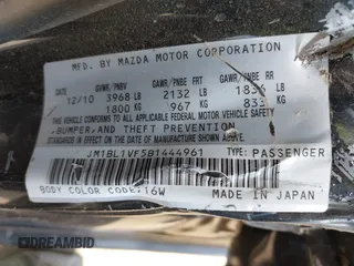 2011 Mazda 3 i Touring z VIN JM1BL1VF5B1444961, wystawiony jako IAAI lot #42047855 z przebiegiem 156 037 mil mil oraz . Historia ofert i sprzedaży dostępna na DreamBid. Obrazek 9.