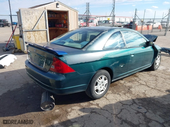 2002 Honda Civic LX with VIN 1HGEM22522L018081, listed as a IAAI auction lot 41329541 with 87,534 mi miles. Bid and sale history available at carsss.com. Image 4.