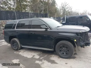 2016 Chevrolet Tahoe Commercial with VIN 1GNSKDEC4GR387517, listed as a IAAI auction lot 41650926 with 120,115 mi miles. Bid and sale history available at carsss.com. Image 14.