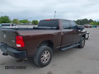 2015 Ram 2500 Tradesman with VIN 3C6TR5CT2FG500792, listed as a IAAI auction lot 42108585 with 113,216 mi miles. Bid and sale history available at carsss.com. Image 4.