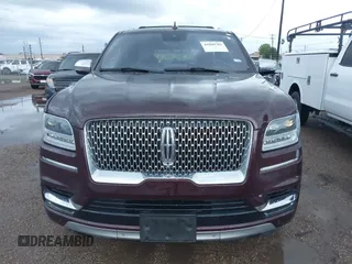 2018 Lincoln Navigator Black Label z VIN 5LMJJ2TT0JEL18765, wystawiony jako IAAI lot #41889782 z przebiegiem 72 190 mil mil oraz . Historia ofert i sprzedaży dostępna na DreamBid. Obrazek 13.
