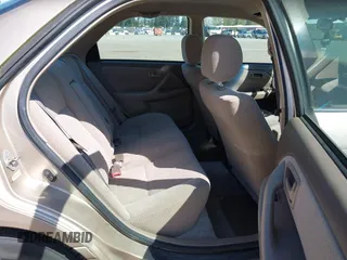2001 Toyota Camry CE with VIN JT2BG22K910581703, listed as a IAAI auction lot 42020085 with 107,035 mi miles. Bid and sale history available at carsss.com. Image 8.