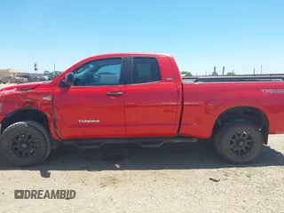 2008 Toyota Tundra z VIN 5TFBV54128X080074, wystawiony jako IAAI lot #42227681 z przebiegiem 176 042 mil mil oraz . Historia ofert i sprzedaży dostępna na DreamBid. Obrazek 14.