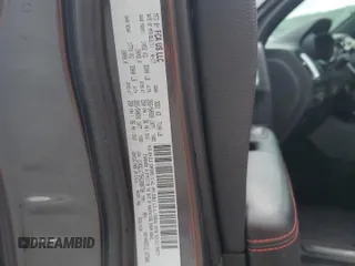 2017 Dodge Durango R/T z VIN 1C4SDJCT5HC898730, wystawiony jako Copart lot #56344635 z przebiegiem 98 996 mil mil oraz Szkoda całkowita • Salvage title. Historia ofert i sprzedaży dostępna na DreamBid. Obrazek 13.