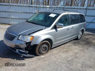 2013 Chrysler Town & Country Touring L with VIN 2C4RC1CG6DR660858, listed as a IAAI auction lot 41970976 with 140,299 mi miles and . Bid and sale history available at DreamBid. Image 22.