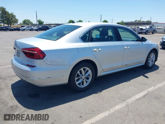 2017 Volkswagen Passat S with VIN 1VWAT7A32HC009657, listed as a IAAI auction lot 42541472 with 100,026 mi miles and . Bid and sale history available at DreamBid. Image 4.