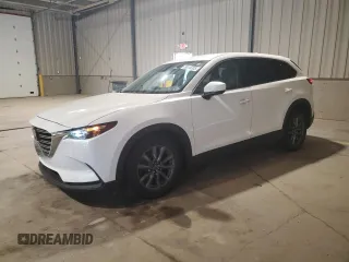 2020 Mazda CX-9 Touring with VIN JM3TCBCY3L0409641, listed as a Copart auction lot 59015305 with 77,495 mi miles and Salvage title. Bid and sale history available at DreamBid. Image 1.