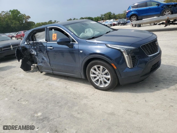 2022 Cadillac XT4 FWD Luxury with VIN 1GYAZAR47NF120348, listed as a Copart auction lot 50187025 with 76,886 mi miles and Non Repairable. Bid and sale history available at carsss.com. Image 4.