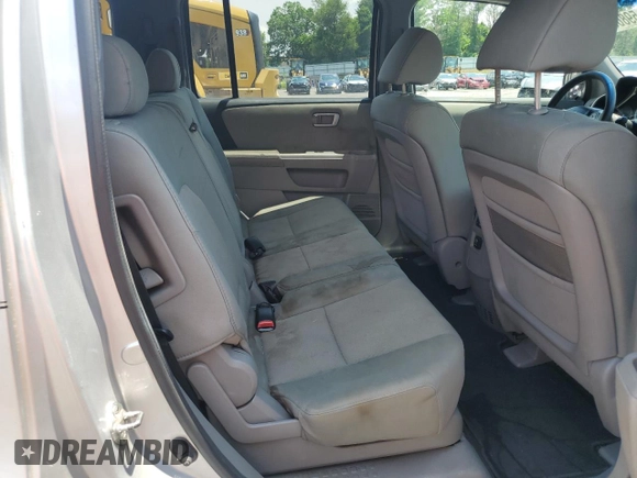 2009 Honda Pilot LX with VIN 5FNYF48259B040040, listed as a Copart auction lot 59860445 with 213,459 mi miles and Salvage title. Bid and sale history available at DreamBid. Image 11.