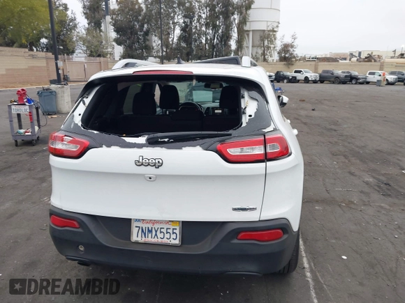 2015 Jeep Cherokee Latitude with VIN 1C4PJLCB0FW761871, listed as a IAAI auction lot 42099336 with 213,049 mi miles and . Bid and sale history available at DreamBid. Image 17.
