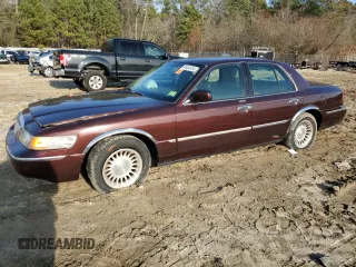 2001 Mercury Grand Marquis LS z VIN 2MEFM75W41X706118, wystawiony jako Copart lot #84484434 z przebiegiem 104 946 mil mil oraz Szkoda całkowita • Salvage title. Historia ofert i sprzedaży dostępna na DreamBid. Obrazek 1.