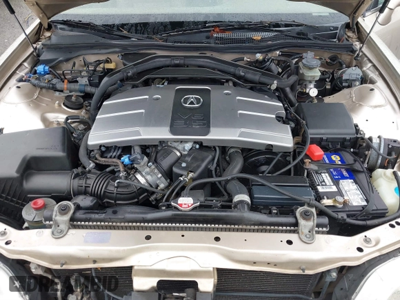 2000 Acura RL w/Navigation System with VIN JH4KA9662YC001438, listed as a IAAI auction lot 41522017 with 169,129 mi miles. Bid and sale history available at carsss.com. Image 10.