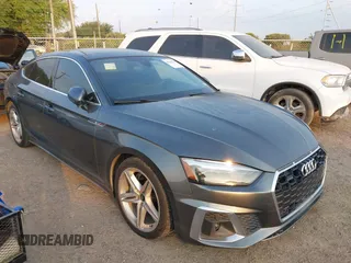 2021 Audi A5 Sportback S line Premium z VIN WAUDACF54MA057382, wystawiony jako IAAI lot #42141307 z przebiegiem 79 908 mil mil oraz . Historia ofert i sprzedaży dostępna na DreamBid. Obrazek 1.