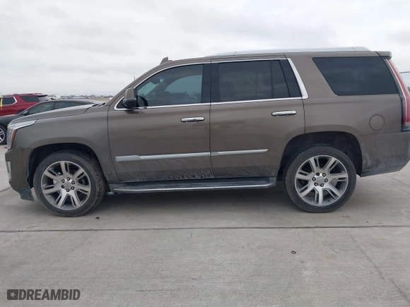 2015 Cadillac Escalade Luxury with VIN 1GYS3MKJ9FR725818, listed as a IAAI auction lot 41596731 with 224,246 mi miles. Bid and sale history available at carsss.com. Image 14.