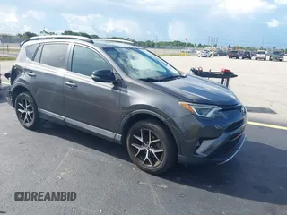 2016 Toyota RAV4 SE with VIN 2T3NFREV7GW290241, listed as a IAAI auction lot 42592793 with 154,689 mi miles and . Bid and sale history available at DreamBid. Image 1.