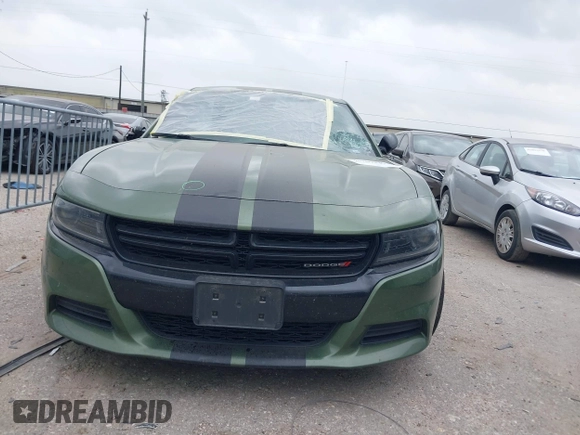 2022 Dodge Charger SXT with VIN 2C3CDXBG8NH162129, listed as a IAAI auction lot 41759139 with 92,061 mi miles and . Bid and sale history available at DreamBid. Image 6.