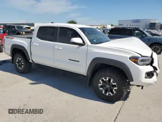 2023 Toyota Tacoma SR z VIN 3TMCZ5AN8PM589655, wystawiony jako Copart lot #56663615 z przebiegiem 43 327 mil mil oraz Szkoda całkowita • Salvage title. Historia ofert i sprzedaży dostępna na DreamBid. Obrazek 4.