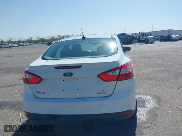 2013 Ford Focus SE with VIN 1FADP3F26DL203377, listed as a IAAI auction lot 41998750 with 70,000 mi miles. Bid and sale history available at carsss.com. Image 16.
