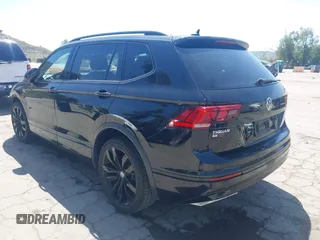 2021 Volkswagen Tiguan SE with VIN 3VV3B7AX0MM015825, listed as a IAAI auction lot 41955268 with 57,909 mi miles and . Bid and sale history available at DreamBid. Image 3.