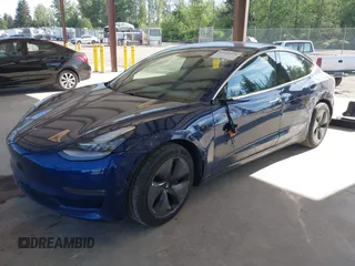 2018 Tesla Model 3 Long Range Battery z VIN 5YJ3E1EA6JF041970, wystawiony jako IAAI lot #42224514 z przebiegiem 79 744 mil mil oraz . Historia ofert i sprzedaży dostępna na DreamBid. Obrazek 17.