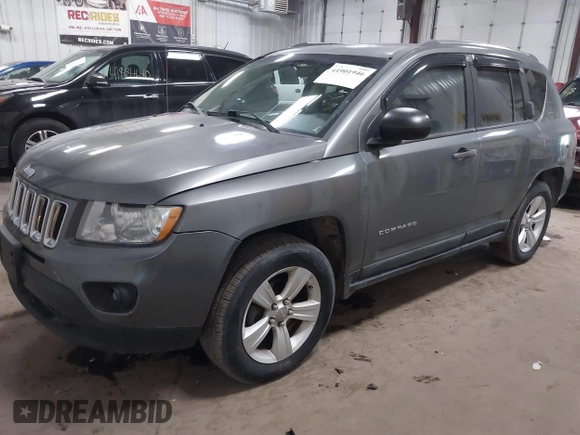 2011 Jeep Compass with VIN 1J4NF1FB3BD278383, listed as a IAAI auction lot 41901946 with 127,083 mi miles and . Bid and sale history available at DreamBid. Image 2.